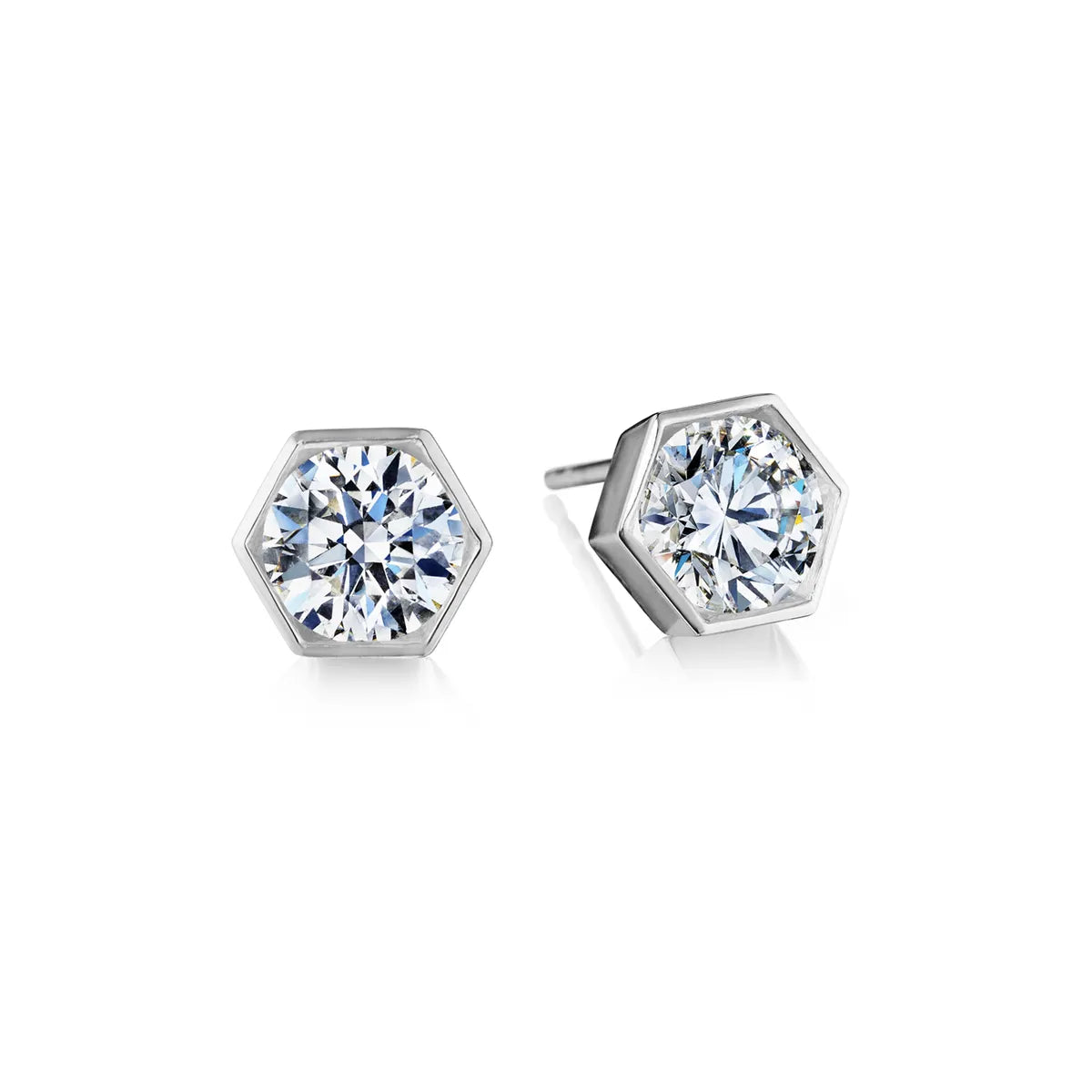 18k gold diamond earrings with hexagonal design and round brilliant diamonds.