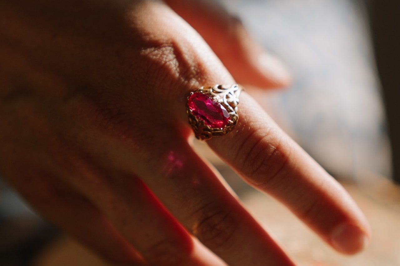 woman with ruby ring