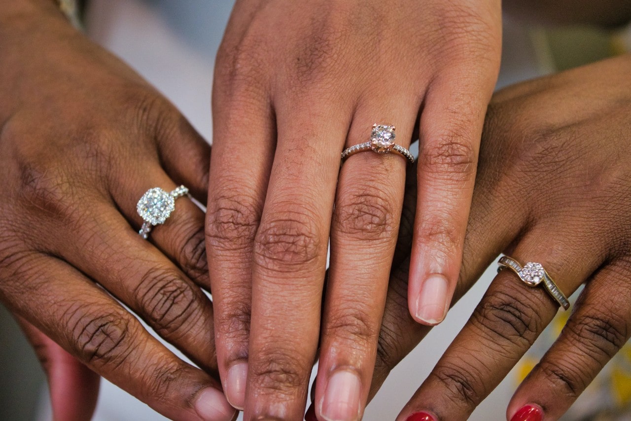 three engagement rings	