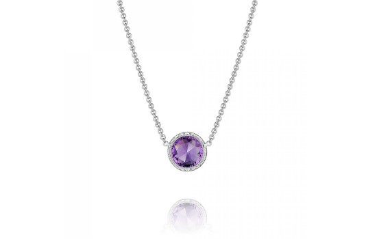 A silver pendant fitted with an amethyst gemstone against a white background