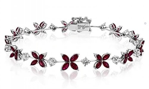 Simon G. bracelet with ruby petals and diamond stations