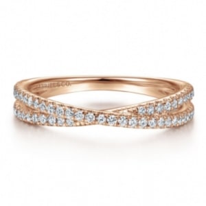 A rose gold crossover ring with pave diamonds from Gabriel & Co.