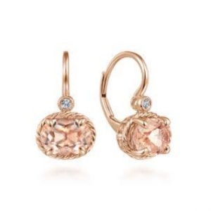 A pair of gold morganite huggie earrings from Gabriel & Co.