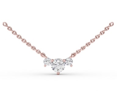 a trio of diamonds on a necklace from Fana.